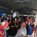 Queue to board ferry , Mersing