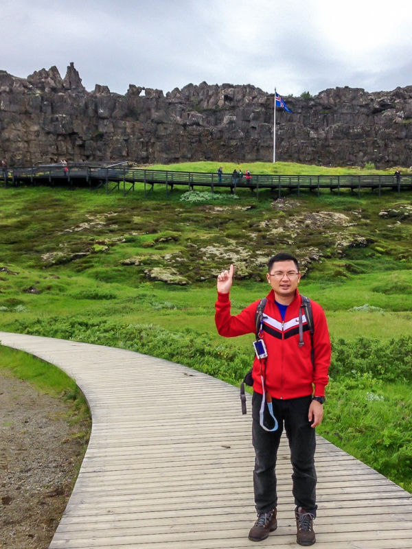 Law Rock with Iceland national flag. Thingvellir National Park, Iceland (Attractions around Reykjavik)