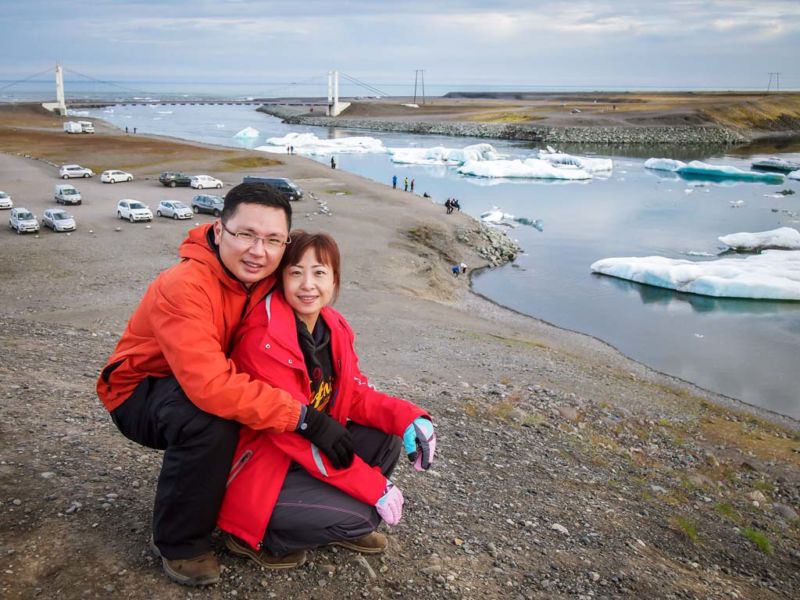 Icebergs melt into smaller pieces before finally drifting slowly out towards the Atlantic Ocean (background). (Must-see places in Southeast Iceland)