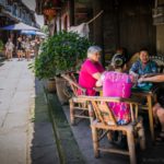 Elders enjoying a game of mahjong. HuangLongXi Ancient town (Chengdu, China)
