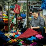 Retailer in Dong Xuan Market (Hanoi, Vietnam)