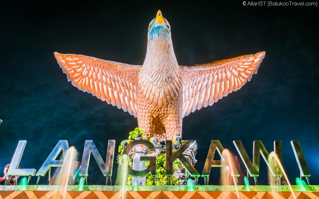 Spotlights illuminate the statue at Eagle Square during evenings (Langkawi)