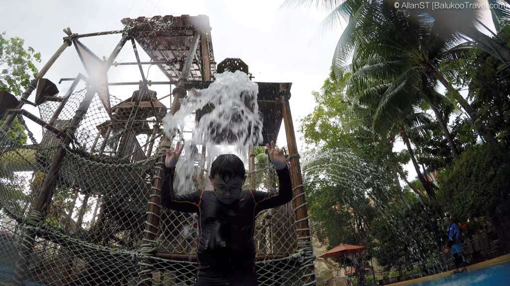 Getting a splash at the Big Bucket Treehouse 