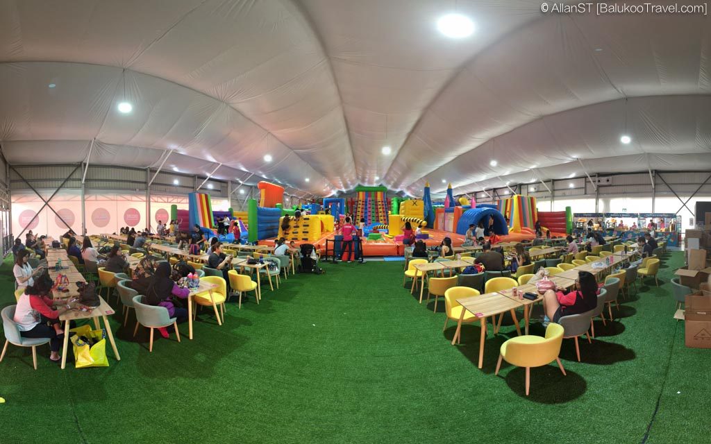 Resting area with the inflatable play area in the background