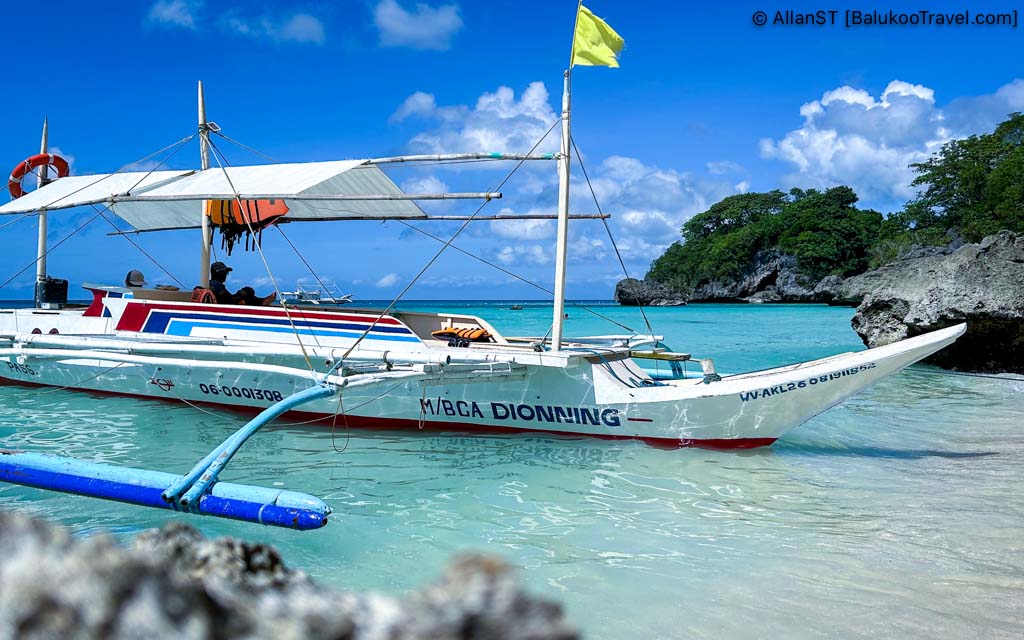 Stopping at one of Boracay's beach as part of the island hopping cruise. 