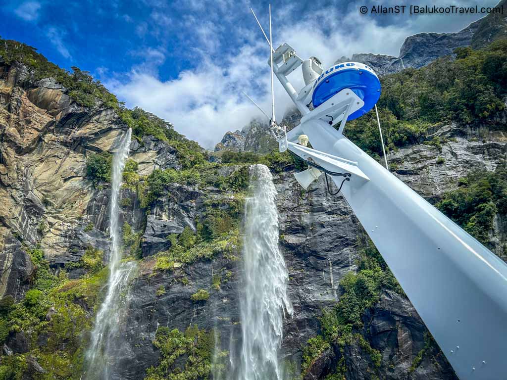 The fiord receives heavy rainfall, creating stunning temporary waterfalls that plunge from sheer rock faces into the deep waters below.