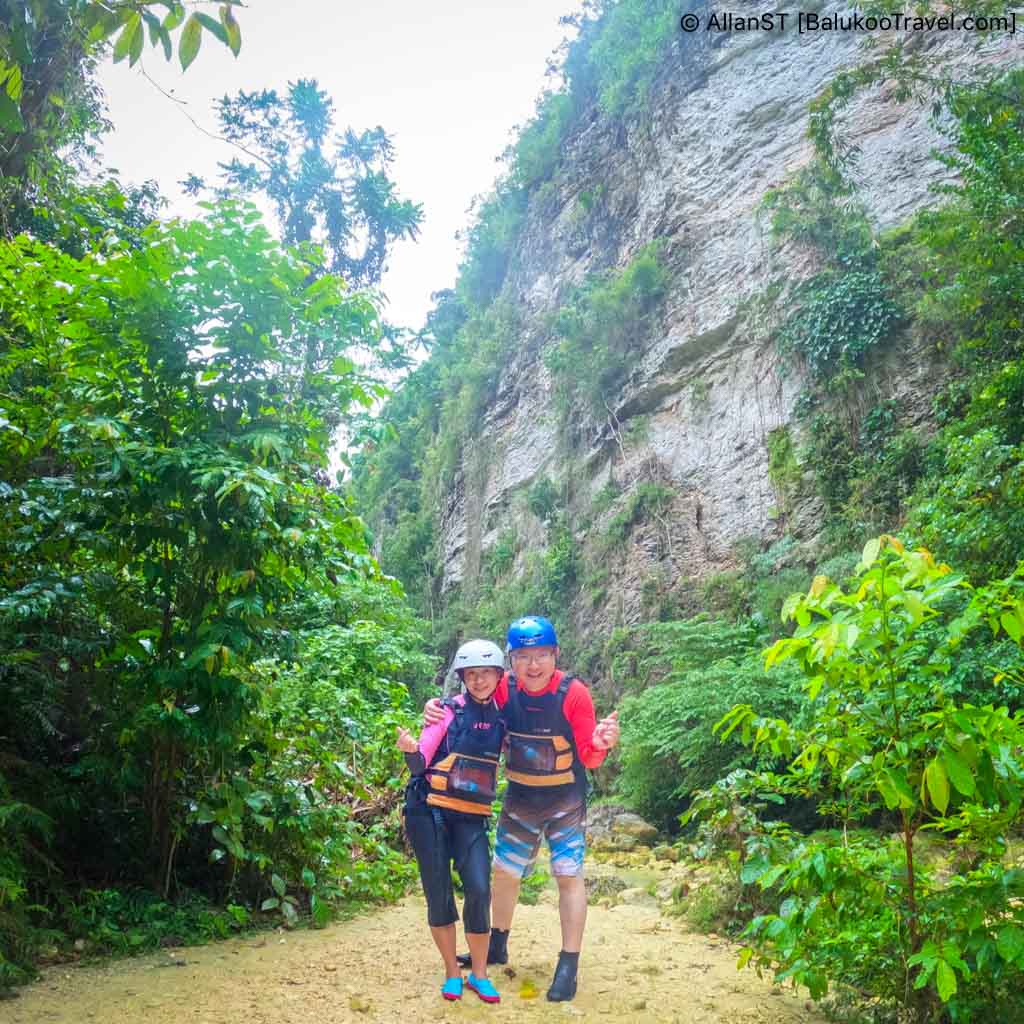 Participants traverse through lush canyons