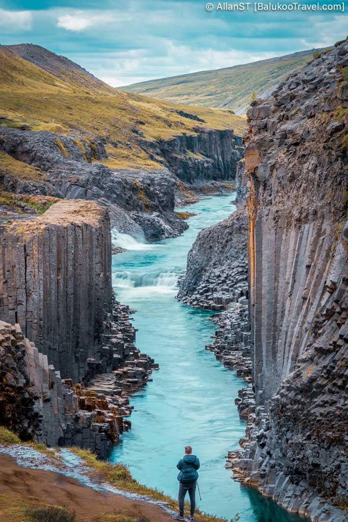Studlagil Canyon is famous for its striking basalt columns and vivid glacial river.